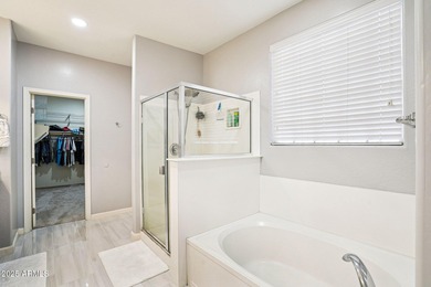 Welcome to your dream home! This stunning 5-bedroom, 3-bath on The Golf Club At Johnson Ranch in Arizona - for sale on GolfHomes.com, golf home, golf lot