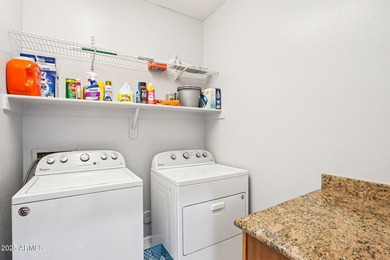 Welcome to your dream home! This stunning 5-bedroom, 3-bath on The Golf Club At Johnson Ranch in Arizona - for sale on GolfHomes.com, golf home, golf lot