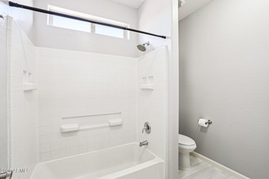 Welcome to your dream home! This stunning 5-bedroom, 3-bath on The Golf Club At Johnson Ranch in Arizona - for sale on GolfHomes.com, golf home, golf lot