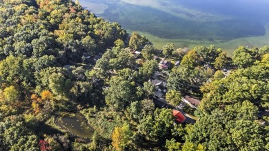 Not just your everyday cottage!  This cute off-water bungalow is on Cedar Lake Golf Course in Indiana - for sale on GolfHomes.com, golf home, golf lot