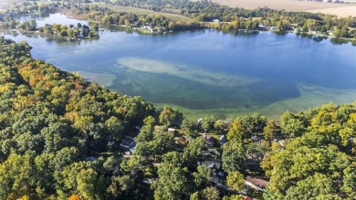 Not just your everyday cottage!  This cute off-water bungalow is on Cedar Lake Golf Course in Indiana - for sale on GolfHomes.com, golf home, golf lot