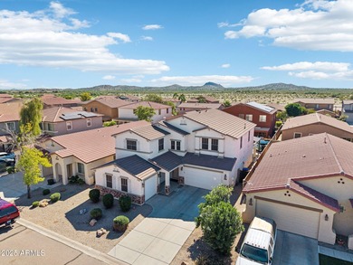 Welcome to your dream home! This stunning 5-bedroom, 3-bath on The Golf Club At Johnson Ranch in Arizona - for sale on GolfHomes.com, golf home, golf lot