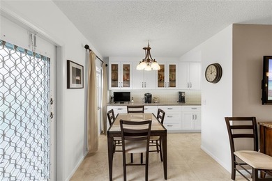 BEAUTIFULLY REMODELED, FIRST FLOOR 2 BEDROOM, 1.5 BATH CONDO on Hillsboro Pines Golf in Florida - for sale on GolfHomes.com, golf home, golf lot