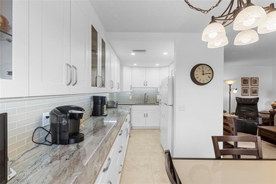 BEAUTIFULLY REMODELED, FIRST FLOOR 2 BEDROOM, 1.5 BATH CONDO on Hillsboro Pines Golf in Florida - for sale on GolfHomes.com, golf home, golf lot