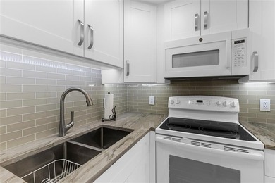 BEAUTIFULLY REMODELED, FIRST FLOOR 2 BEDROOM, 1.5 BATH CONDO on Hillsboro Pines Golf in Florida - for sale on GolfHomes.com, golf home, golf lot