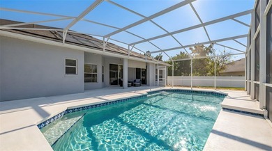 Welcome to this lovely pool home on an oversized lot with a huge on Ridgewood Lakes Golf and Country Club in Florida - for sale on GolfHomes.com, golf home, golf lot