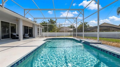 Welcome to this lovely pool home on an oversized lot with a huge on Ridgewood Lakes Golf and Country Club in Florida - for sale on GolfHomes.com, golf home, golf lot