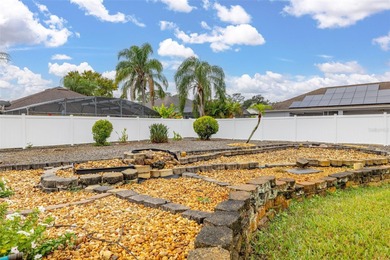 Welcome to this lovely pool home on an oversized lot with a huge on Ridgewood Lakes Golf and Country Club in Florida - for sale on GolfHomes.com, golf home, golf lot