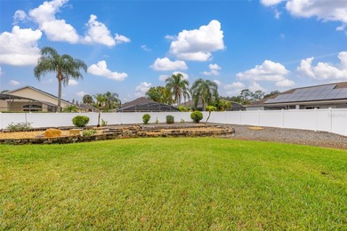 Welcome to this lovely pool home on an oversized lot with a huge on Ridgewood Lakes Golf and Country Club in Florida - for sale on GolfHomes.com, golf home, golf lot