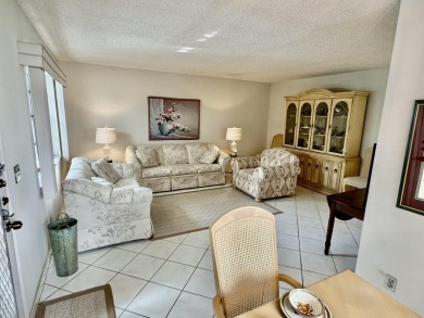 FIRST FLOOR, CORNER UNIT WITH AMAZING GOLF COURSE VIEWS...2 on Kings Point Golf -Flanders Way in Florida - for sale on GolfHomes.com, golf home, golf lot