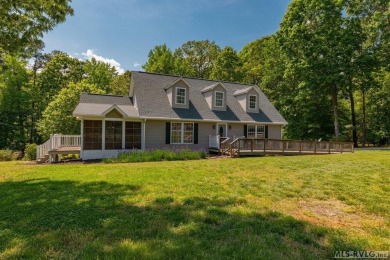 Enjoy main lake views and water-access living from this cape cod on Tanglewood Shores Golf Club in Virginia - for sale on GolfHomes.com, golf home, golf lot