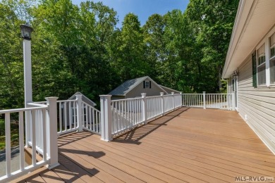 Enjoy main lake views and water-access living from this cape cod on Tanglewood Shores Golf Club in Virginia - for sale on GolfHomes.com, golf home, golf lot