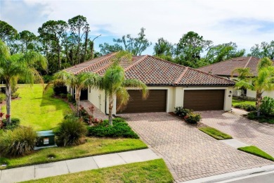 Experience Luxurious Florida Living at 12187 Amica Loop, Venice on Plantation Golf and Country Club in Florida - for sale on GolfHomes.com, golf home, golf lot