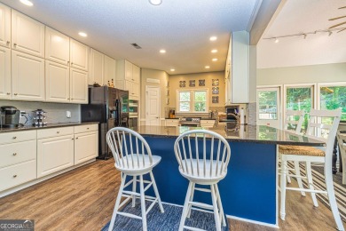 This Beautiful 5 bedroom 3.5 bath home in desirable Windalier on Canongate At Flat Creek Club in Georgia - for sale on GolfHomes.com, golf home, golf lot