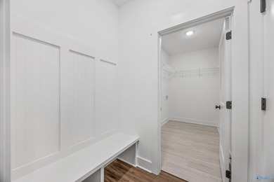 This beautifully crafted residence features an open floor plan on Canebrake Golf Club in AL - for sale on GolfHomes.com, golf home, golf lot