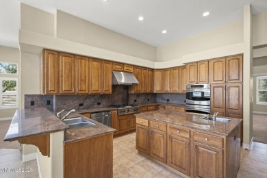 This custom built 4 bed / 4 bath home is nestled at the end of a on Wolf Run Golf Club in Nevada - for sale on GolfHomes.com, golf home, golf lot