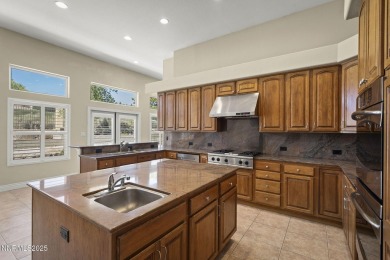 This custom built 4 bed / 4 bath home is nestled at the end of a on Wolf Run Golf Club in Nevada - for sale on GolfHomes.com, golf home, golf lot