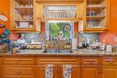 Step into this beautifully upgraded home nestled in the heart of on Miami Springs Golf and Country Club in Florida - for sale on GolfHomes.com, golf home, golf lot