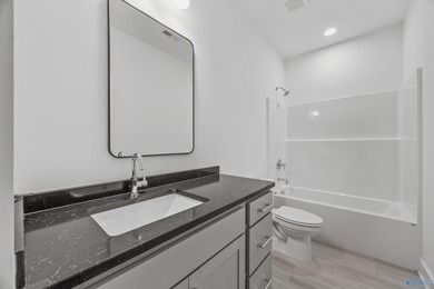 This beautifully crafted residence features an open floor plan on Canebrake Golf Club in AL - for sale on GolfHomes.com, golf home, golf lot