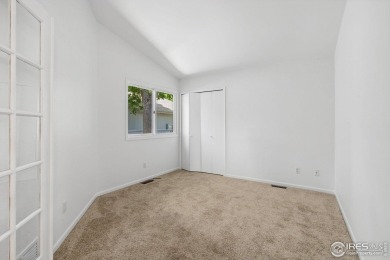 Enjoy easy living in one of Fort Collins' most distinctive on Adriel Hills Golf Course in Colorado - for sale on GolfHomes.com, golf home, golf lot