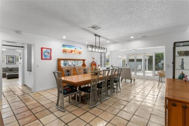 This beautifully maintained ONE story 4-bedroom, 3.5-bathroom on Emerald Greens Golf Resort and Country Club in Florida - for sale on GolfHomes.com, golf home, golf lot