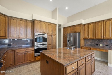 This custom built 4 bed / 4 bath home is nestled at the end of a on Wolf Run Golf Club in Nevada - for sale on GolfHomes.com, golf home, golf lot