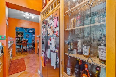 Step into this beautifully upgraded home nestled in the heart of on Miami Springs Golf and Country Club in Florida - for sale on GolfHomes.com, golf home, golf lot