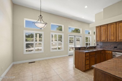 This custom built 4 bed / 4 bath home is nestled at the end of a on Wolf Run Golf Club in Nevada - for sale on GolfHomes.com, golf home, golf lot