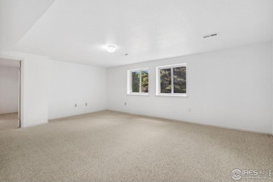 Enjoy easy living in one of Fort Collins' most distinctive on Adriel Hills Golf Course in Colorado - for sale on GolfHomes.com, golf home, golf lot