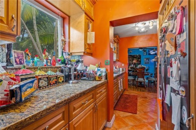 Step into this beautifully upgraded home nestled in the heart of on Miami Springs Golf and Country Club in Florida - for sale on GolfHomes.com, golf home, golf lot