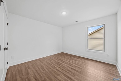 This beautifully crafted residence features an open floor plan on Canebrake Golf Club in AL - for sale on GolfHomes.com, golf home, golf lot