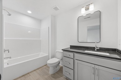 This beautifully crafted residence features an open floor plan on Canebrake Golf Club in AL - for sale on GolfHomes.com, golf home, golf lot