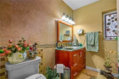 Step into this beautifully upgraded home nestled in the heart of on Miami Springs Golf and Country Club in Florida - for sale on GolfHomes.com, golf home, golf lot