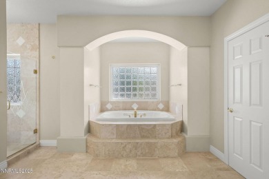This custom built 4 bed / 4 bath home is nestled at the end of a on Wolf Run Golf Club in Nevada - for sale on GolfHomes.com, golf home, golf lot