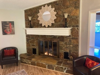 ABSOLUTELY STUNNING! MOVE-IN READY with STORAGE GALORE! on Cherokee Village North Course in Arkansas - for sale on GolfHomes.com, golf home, golf lot