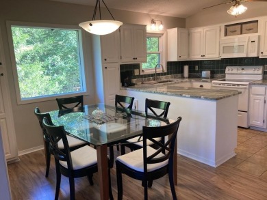 ABSOLUTELY STUNNING! MOVE-IN READY with STORAGE GALORE! on Cherokee Village North Course in Arkansas - for sale on GolfHomes.com, golf home, golf lot