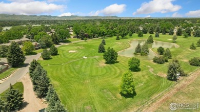 Enjoy easy living in one of Fort Collins' most distinctive on Adriel Hills Golf Course in Colorado - for sale on GolfHomes.com, golf home, golf lot