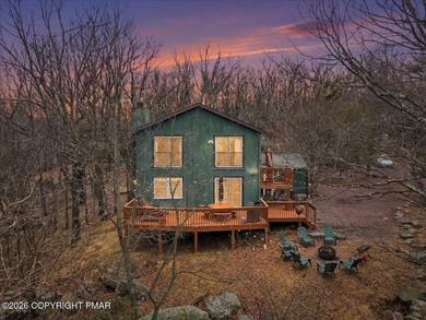 Perched on a private ridge in the sought-after Lake Harmony on Split Rock Resort and Country Club in Pennsylvania - for sale on GolfHomes.com, golf home, golf lot