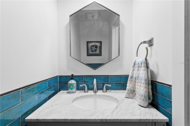 This beautifully maintained ONE story 4-bedroom, 3.5-bathroom on Emerald Greens Golf Resort and Country Club in Florida - for sale on GolfHomes.com, golf home, golf lot