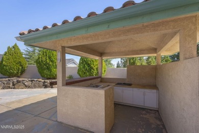 This custom built 4 bed / 4 bath home is nestled at the end of a on Wolf Run Golf Club in Nevada - for sale on GolfHomes.com, golf home, golf lot