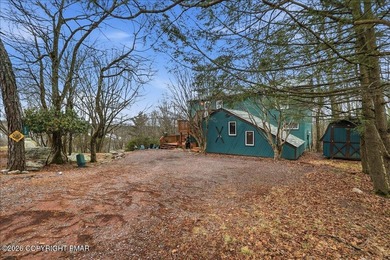 Perched on a private ridge in the sought-after Lake Harmony on Split Rock Resort and Country Club in Pennsylvania - for sale on GolfHomes.com, golf home, golf lot