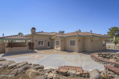 This custom built 4 bed / 4 bath home is nestled at the end of a on Wolf Run Golf Club in Nevada - for sale on GolfHomes.com, golf home, golf lot