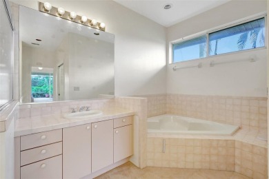 Pool Home with Stunning Golf & Lake Views in The Highlands at on The Meadows Golf and Country Club in Florida - for sale on GolfHomes.com, golf home, golf lot
