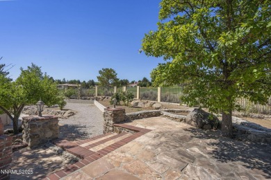 This custom built 4 bed / 4 bath home is nestled at the end of a on Wolf Run Golf Club in Nevada - for sale on GolfHomes.com, golf home, golf lot