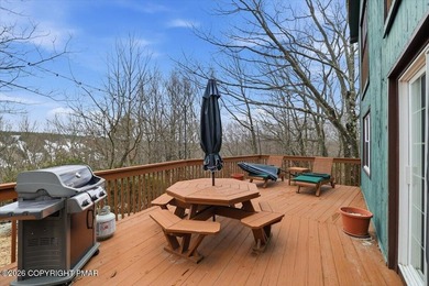 Perched on a private ridge in the sought-after Lake Harmony on Split Rock Resort and Country Club in Pennsylvania - for sale on GolfHomes.com, golf home, golf lot