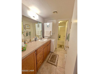 Step into easy Lake Havasu living in this inviting 2 bedroom, 1 on London Bridge Golf Course in Arizona - for sale on GolfHomes.com, golf home, golf lot