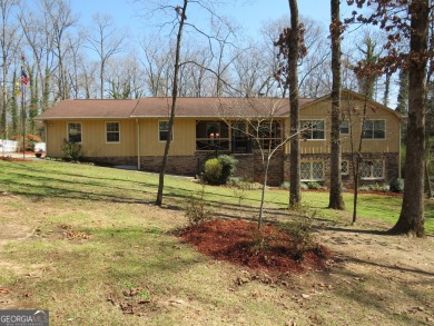 Sprawling brick ranch over full basement located in great area on Cherokee Golf and Country Club in Georgia - for sale on GolfHomes.com, golf home, golf lot