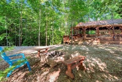 Lake life made easy--and fun! This Lake Gaston camper sits on a on River Ridge Golf Club in Virginia - for sale on GolfHomes.com, golf home, golf lot