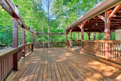 Lake life made easy--and fun! This Lake Gaston camper sits on a on River Ridge Golf Club in Virginia - for sale on GolfHomes.com, golf home, golf lot