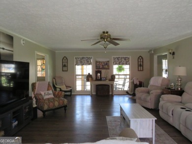 Sprawling brick ranch over full basement located in great area on Cherokee Golf and Country Club in Georgia - for sale on GolfHomes.com, golf home, golf lot